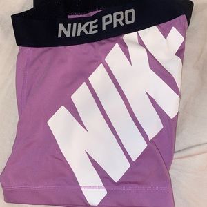 Purple Nike pros